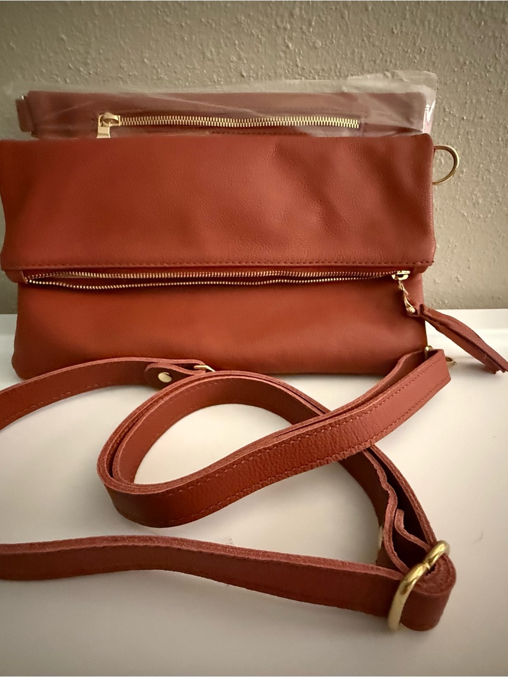 2 X’s Convertible Crossbody Clutch in Rust - Picture 2 of 4